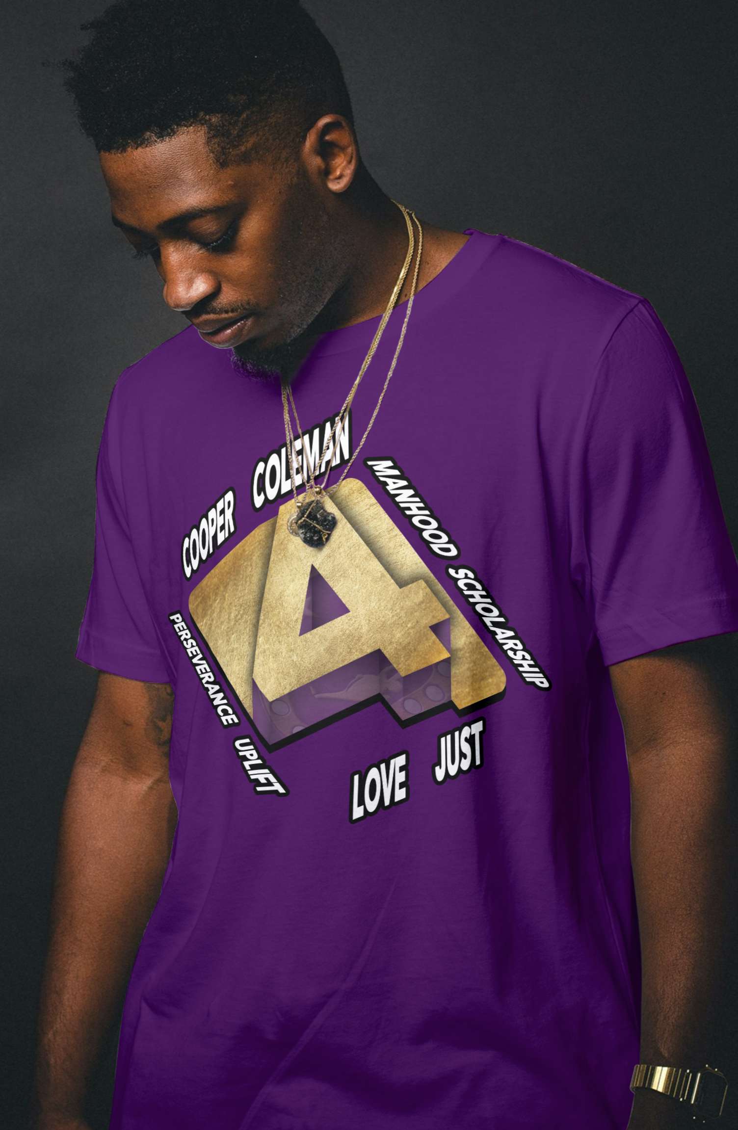 A QUE DAWG wearing a royal purple t-shirt with old gold text and graphics on a dark background