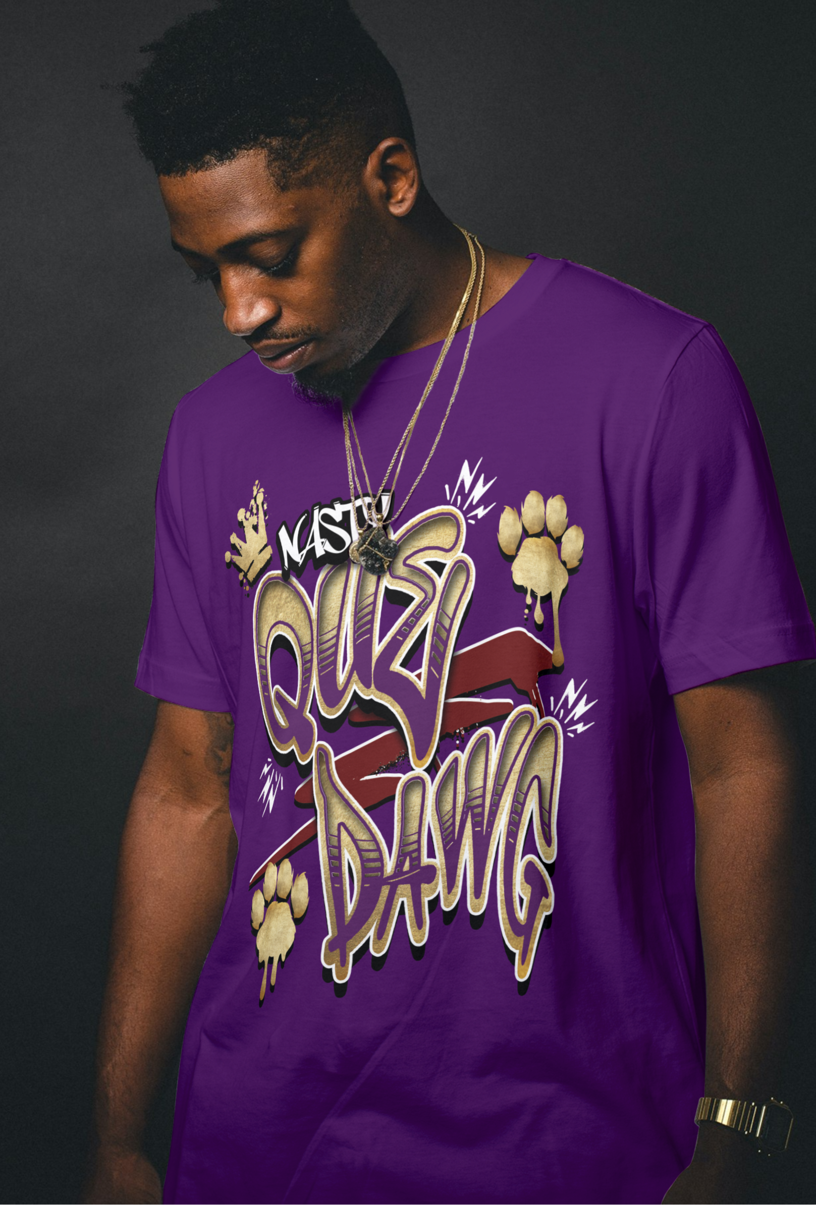 Omega Man wearing a royal purple and old gold Nasty Que Dawg  t-shirt with graphic design on a dark background